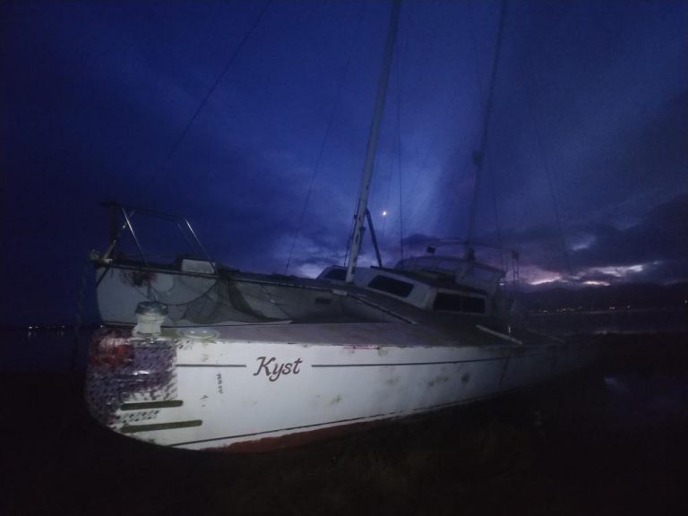 Sailboat beached at Mack Laing Park