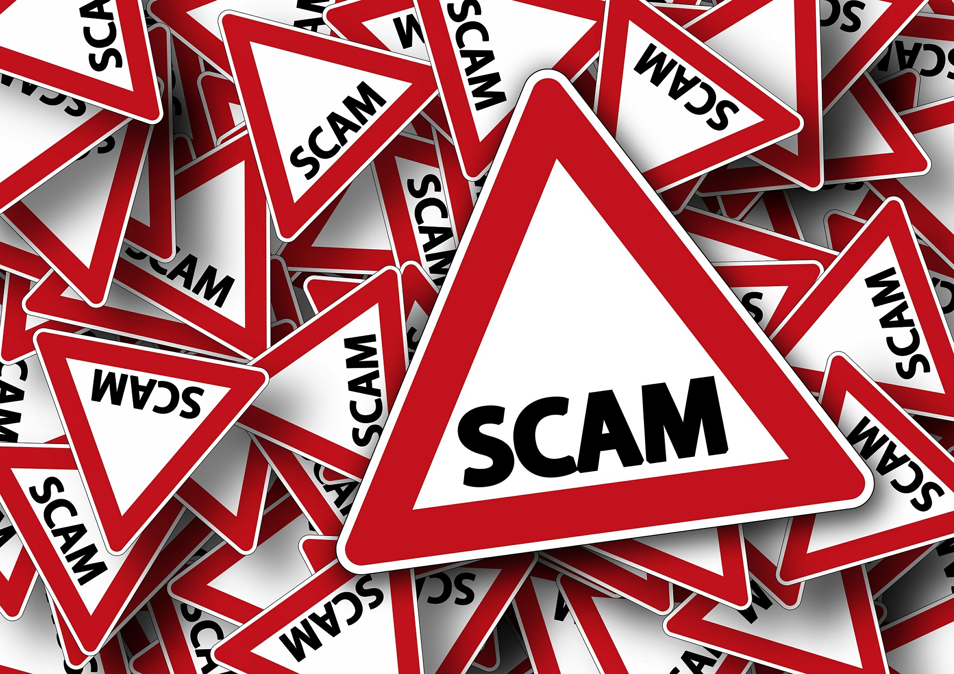 تحذير موقع نصاب Adnow Scam Road-sign-464653_1920