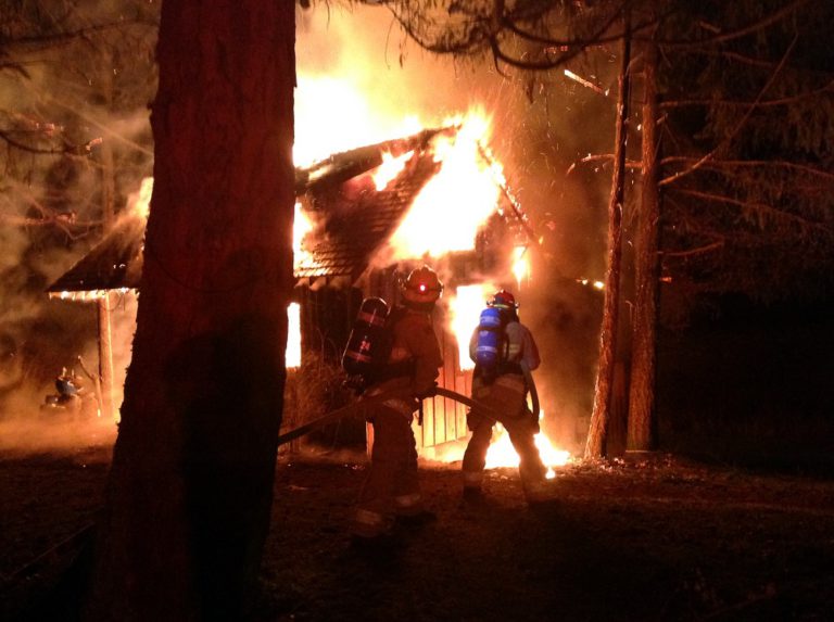 Bystanders pull man from burning cabin in Oyster River