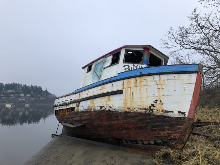 ‘Dead’ derelict boats pulled from Goose Spit K’omoks First Nation harbour