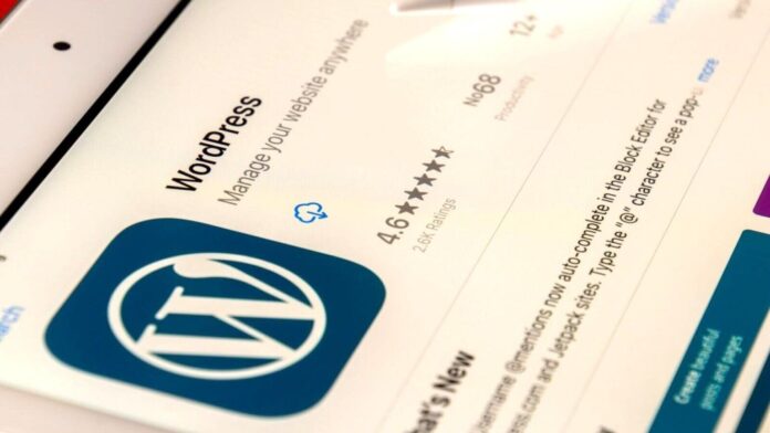 An iPad with WordPress admin screen visible